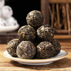 Wholesale factory price compressed fermented/ripe puerh tea flavored Chinese