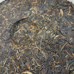 Laomane Arbor Tree Spring Buds Pu-erh Tea Cake 357g Raw Pu'er QiZi Banzhang