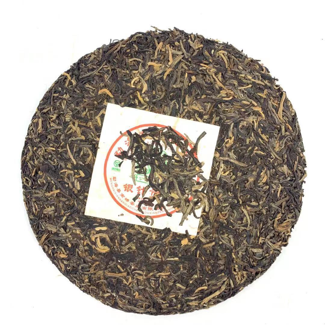 2006 Nanqiao Menghai Arbor Wild Tea Silver Needle Tribute Cake Raw Pu'er 250g