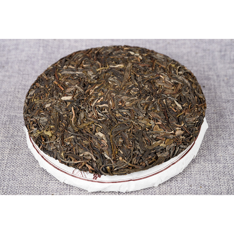 Yiwu Fenghuang Wo Seven Seeds Cake Spring Tea Organic Green Tea Tea Cake 357g