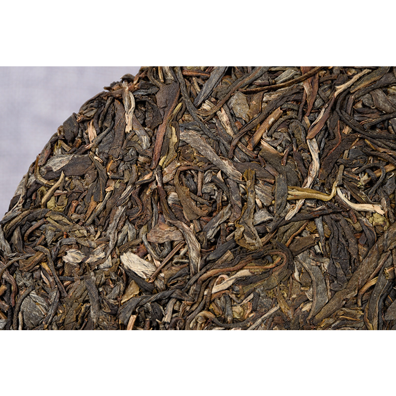 Yiwu Fenghuang Wo Seven Seeds Cake Spring Tea Organic Green Tea Tea Cake 357g