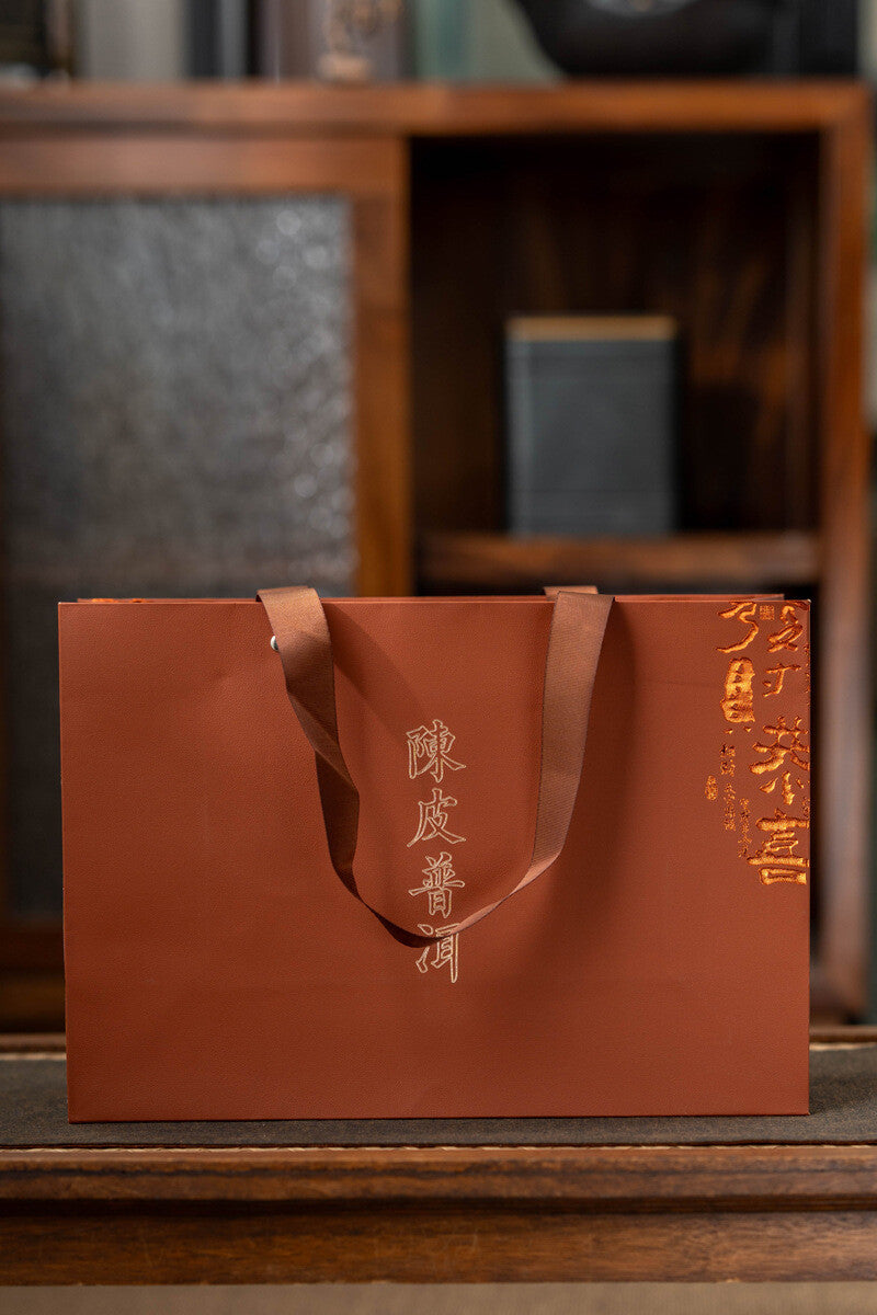 Yunnan Menghai Palace Ripe Tea Xinhui Old Chen Pi Puerh Longzhu Tea 500g