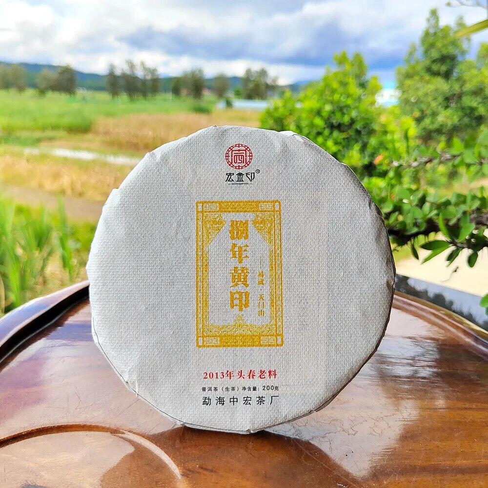 Chinese Raw Puerh Tea Cake Yunnan Qi Zi Bing Cha Sheng Puer 357 Gram Yiwu Pu Er