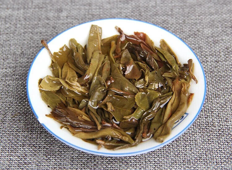 Aged Raw Tea Yunnan Nannuoshan Arbor Qizi Round Tea Cake 357g
