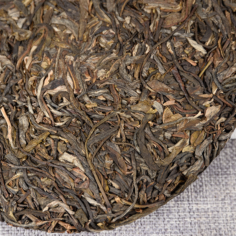 Yiwu Fenghuang Wo Seven Seeds Cake Spring Tea Organic Green Tea Tea Cake 357g