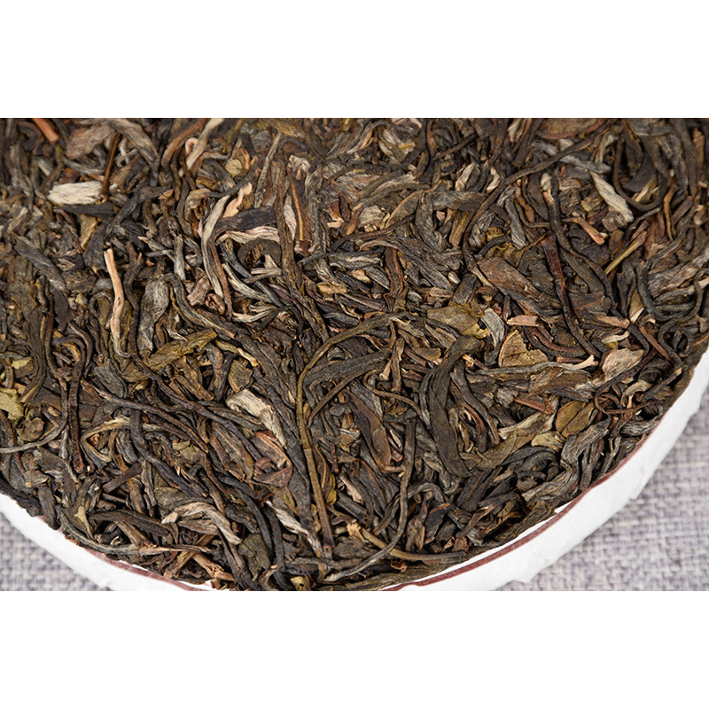 Yiwu Fenghuang Wo Seven Seeds Cake Spring Tea Organic Green Tea Tea Cake 357g