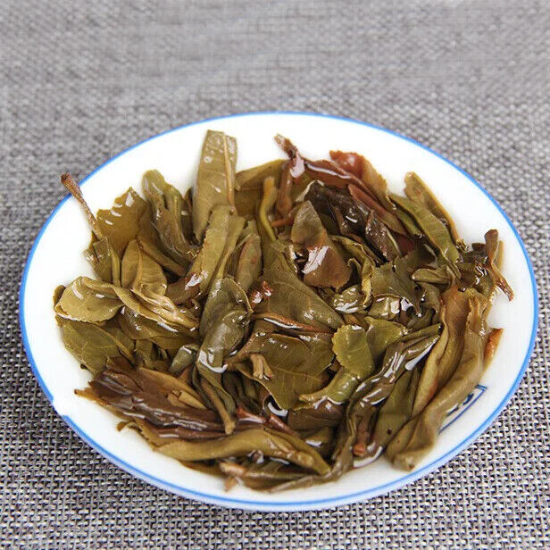 Aged Raw Tea Yunnan Nannuoshan Arbor Qizi Round Tea Cake 357g