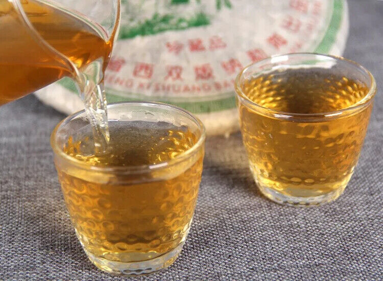 Aged Raw Tea Yunnan Nannuoshan Arbor Qizi Round Tea Cake 357g