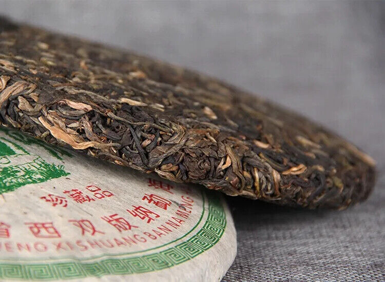 Aged Raw Tea Yunnan Nannuoshan Arbor Qizi Round Tea Cake 357g