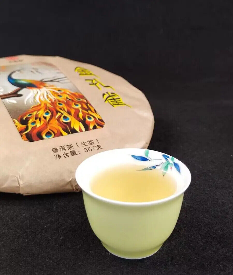Yunnan Yiwu Peacock Puerh Cake Sheng Puer Tea 357g Compressed Raw Puer Tea Cake