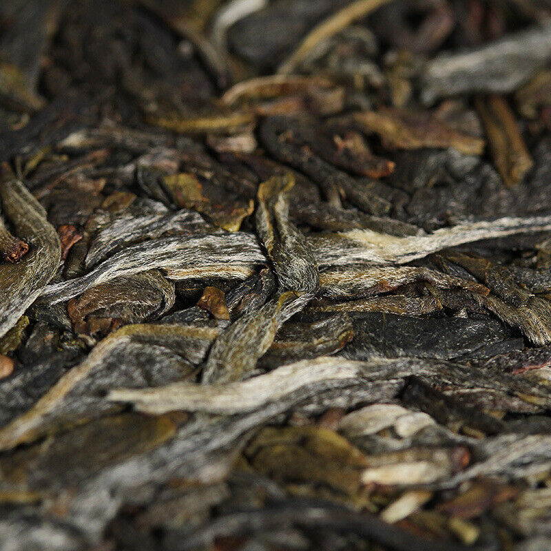 HelloYoung 357g Yunnan Pu'er Tea Xigui (White Cotton) Ming Pre-Spring Seven Seed Cake Tea