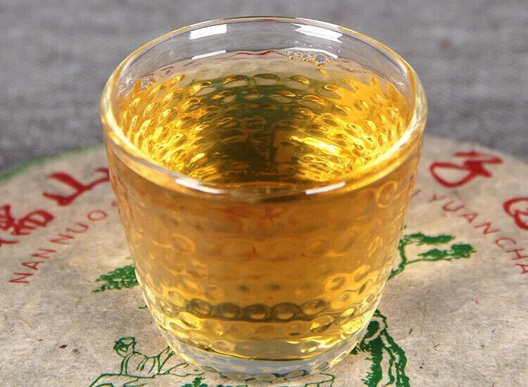 Aged Raw Tea Yunnan Nannuoshan Arbor Qizi Round Tea Cake 357g