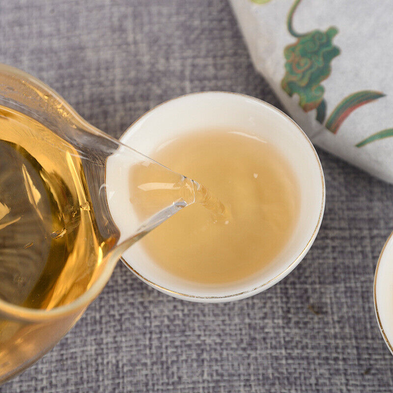 Yiwu Organic Green Tea Spring Tea Yunnan Cake Tea Beneficial Health Tea 357g