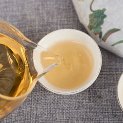 Yiwu Organic Green Tea Spring Tea Yunnan Cake Tea Beneficial Health Tea 357g