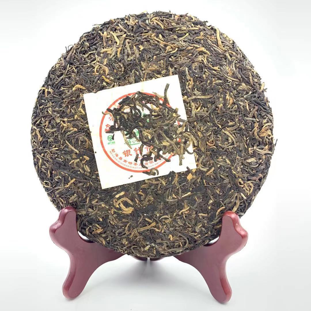 2006 Nanqiao Menghai Arbor Wild Tea Silver Needle Tribute Cake Raw Pu'er 250g