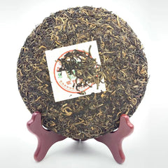 2006 Nanqiao Menghai Arbor Wild Tea Silver Needle Tribute Cake Raw Pu'er 250g
