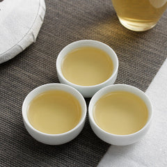 HelloYoung 357g Yunnan Pu'er Tea Xigui (White Cotton) Ming Pre-Spring Seven Seed Cake Tea
