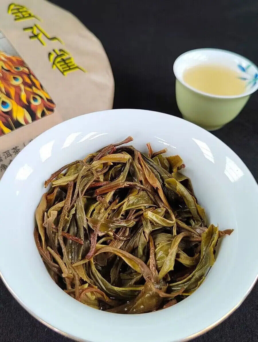 Yunnan Yiwu Peacock Puerh Cake Sheng Puer Tea 357g Compressed Raw Puer Tea Cake