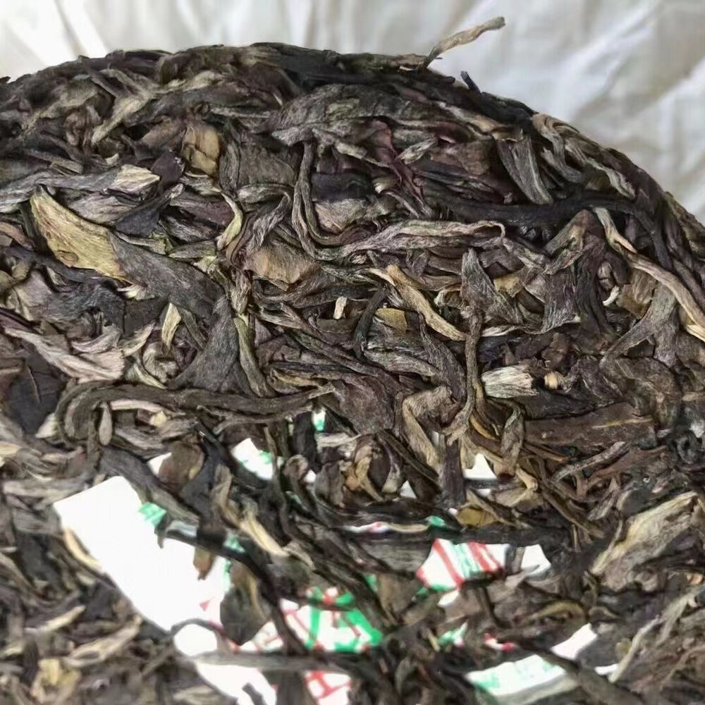 357g Yunnan Pu-erh Pld Raw Tea Qizi Aged Raw Pu'er Tea Cake Pu-erh Cake Tea