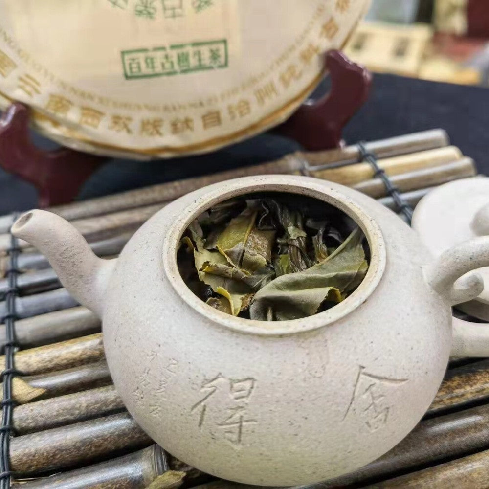 357g Yunnan Aged Pu-erh Raw Tea Cake  Hundred Year Old Tree Raw Puerh Tea
