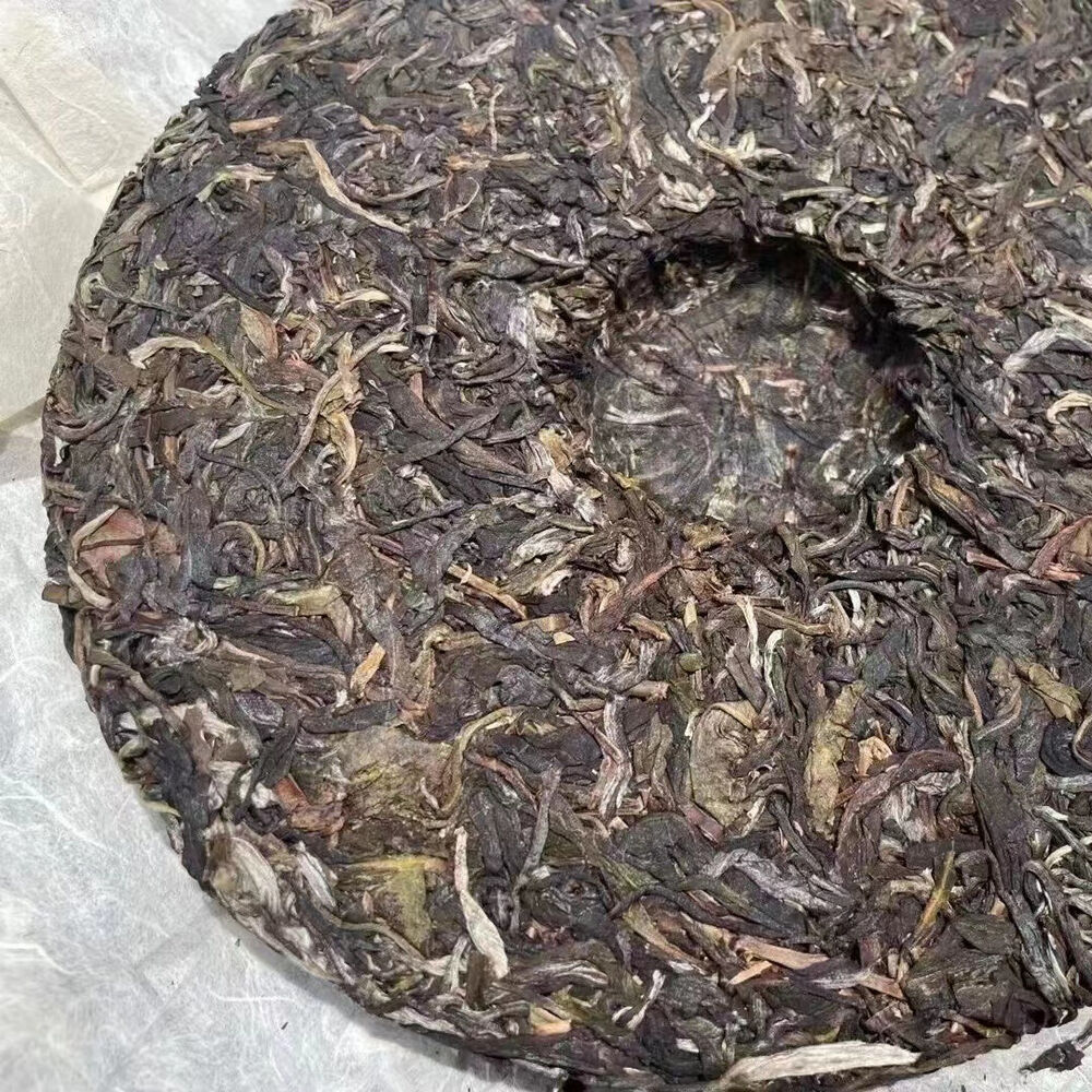 357g Yunnan Raw Pu-erh Cake Tea Bingdao Xiangjin Aged Puerh Raw Tea Cake