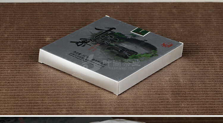 Xiaguan Qian Jia Zhai Wild Aged Old Tree Round Cake Puer Raw Pu'er Tea 357g