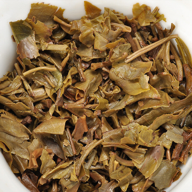 Xiaguan Qian Jia Zhai Wild Aged Old Tree Round Cake Puer Raw Pu'er Tea 357g