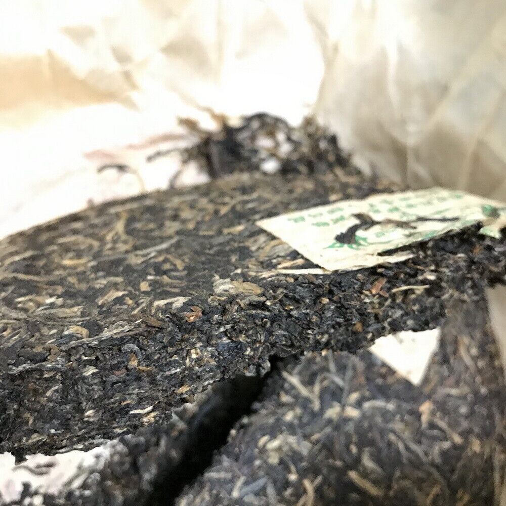 HelloYoung Silver Needle Tributary Puer Meng Hai Qiao Mu Ye Sheng Cha Raw Pu'er 250g