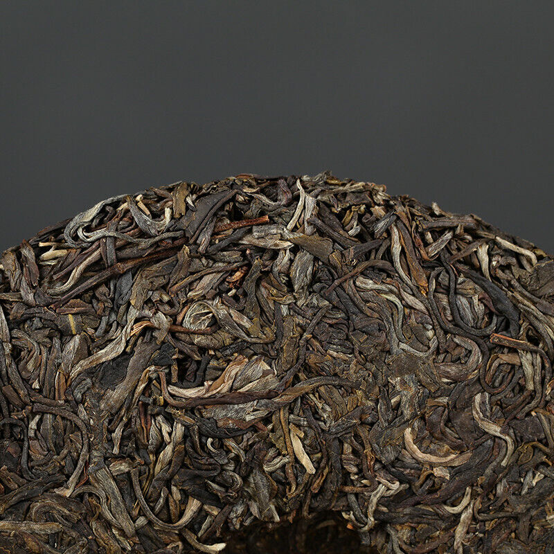 Xiaguan Qian Jia Zhai Wild Aged Old Tree Round Cake Puer Raw Pu'er Tea 357g