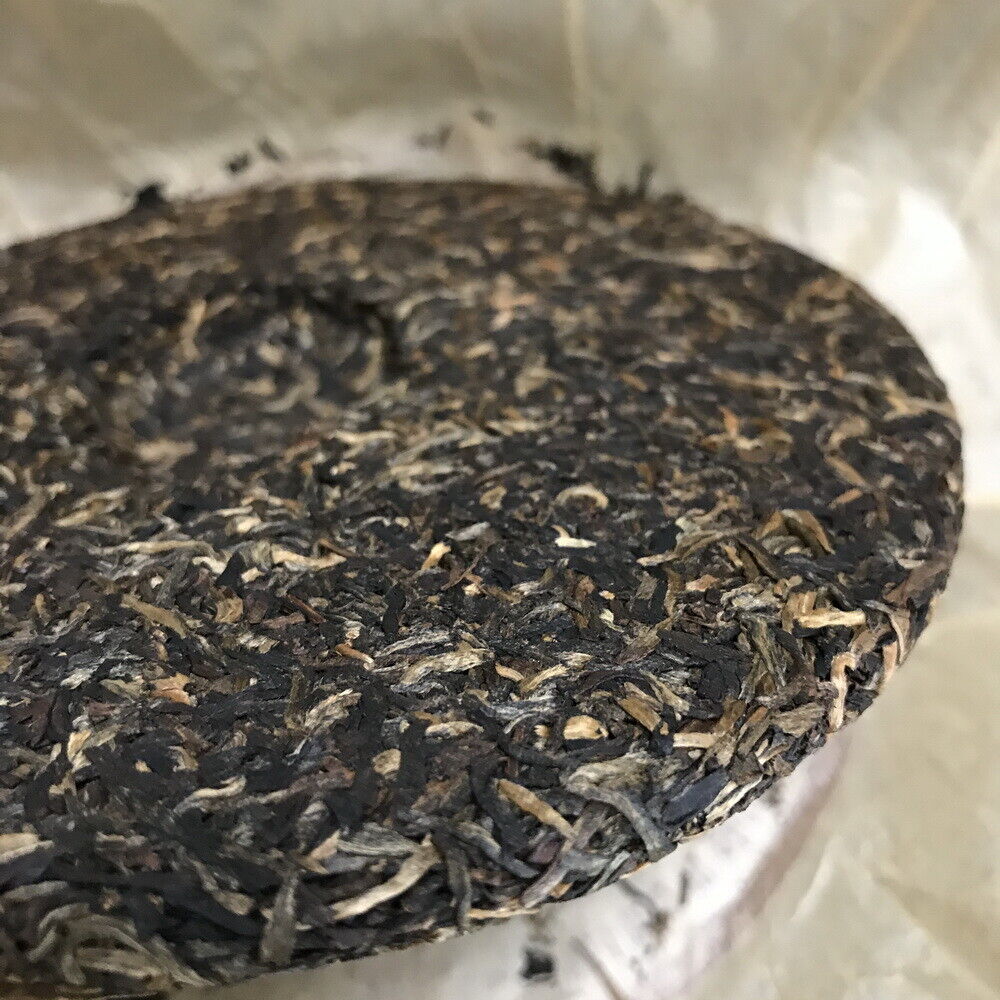 HelloYoung Silver Needle Tributary Puer Meng Hai Qiao Mu Ye Sheng Cha Raw Pu'er 250g