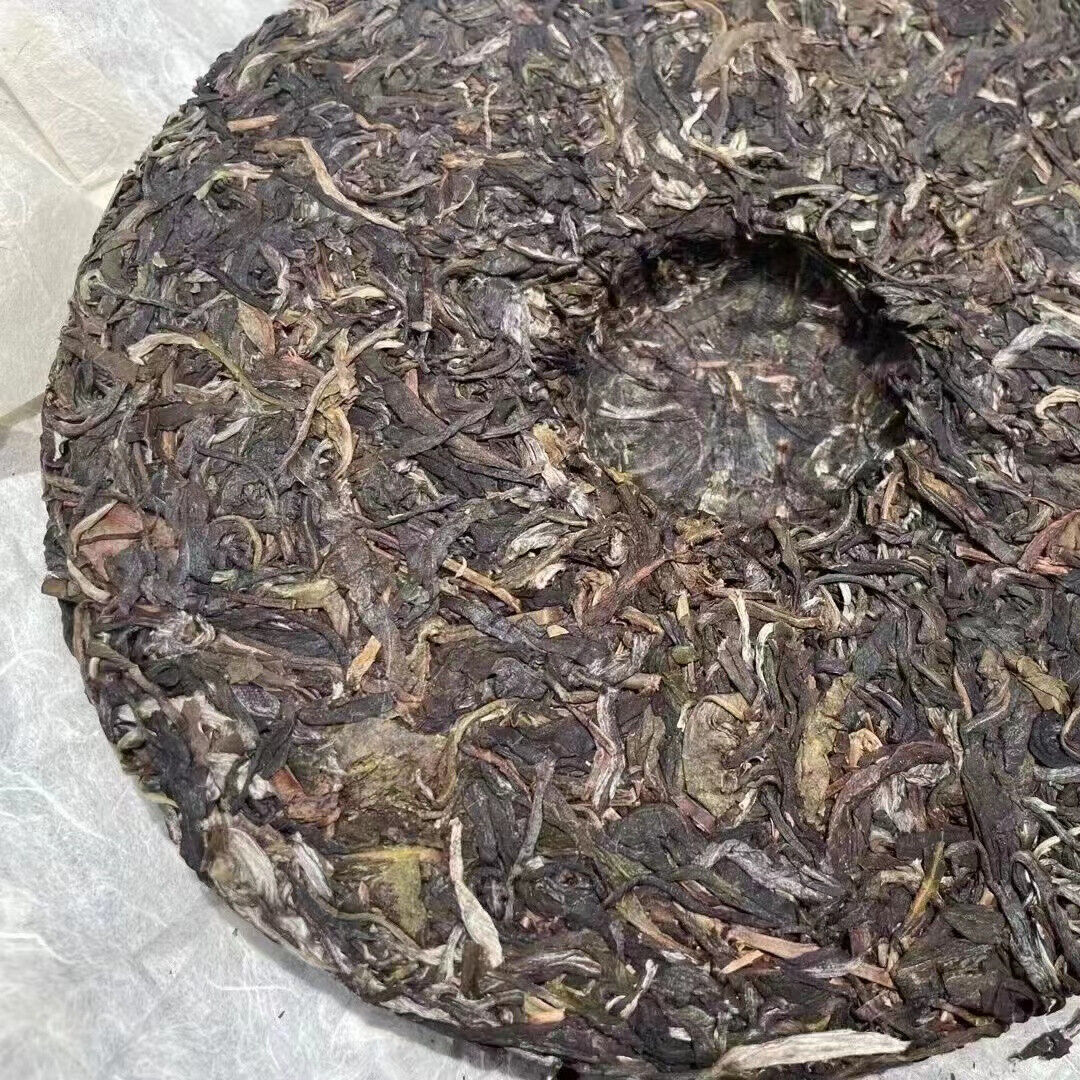 357g Yunnan Raw Pu-erh Cake Tea Bingdao Xiangjin Aged Puerh Raw Tea Cake